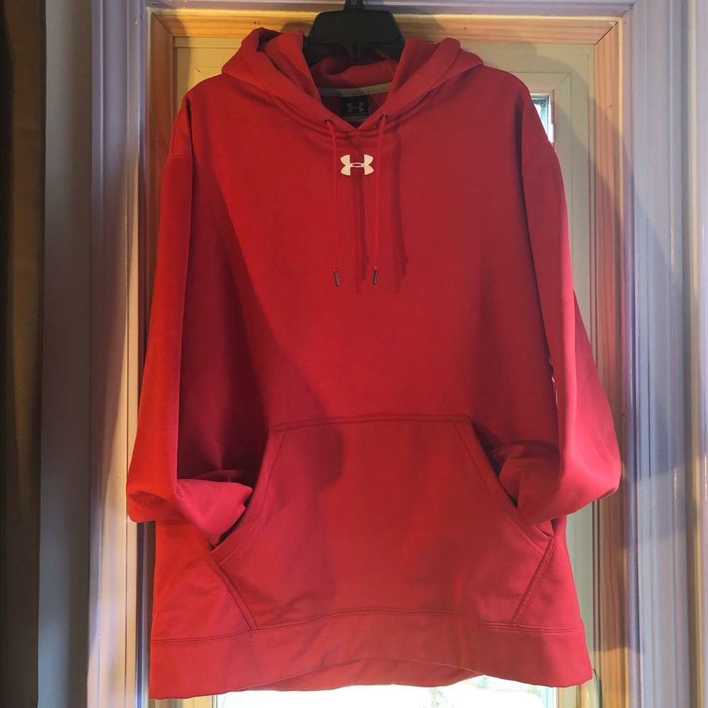 Red Under Armour hooded sweatshirt.